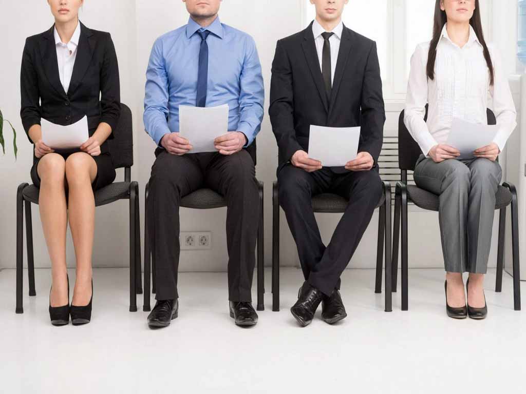 Four applicants waiting for an interview