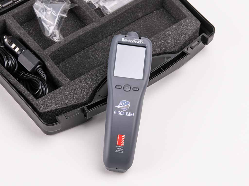 A workplace breathalyser with a carrying case