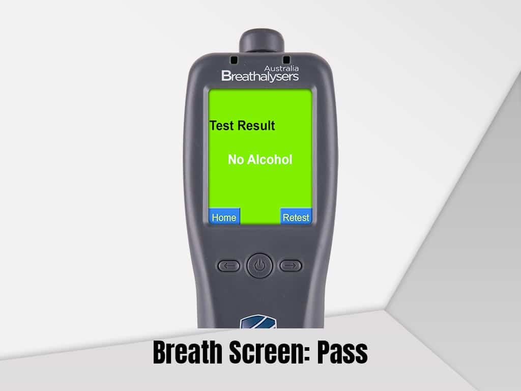 A breathalyser showing a 'no alcohol' test result on an LCD.
