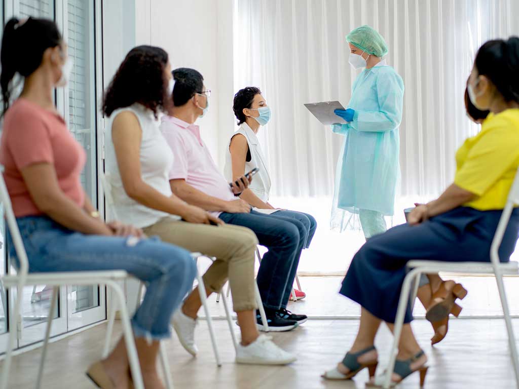 People waiting in a testing facility