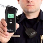 A police showing a breathalyser